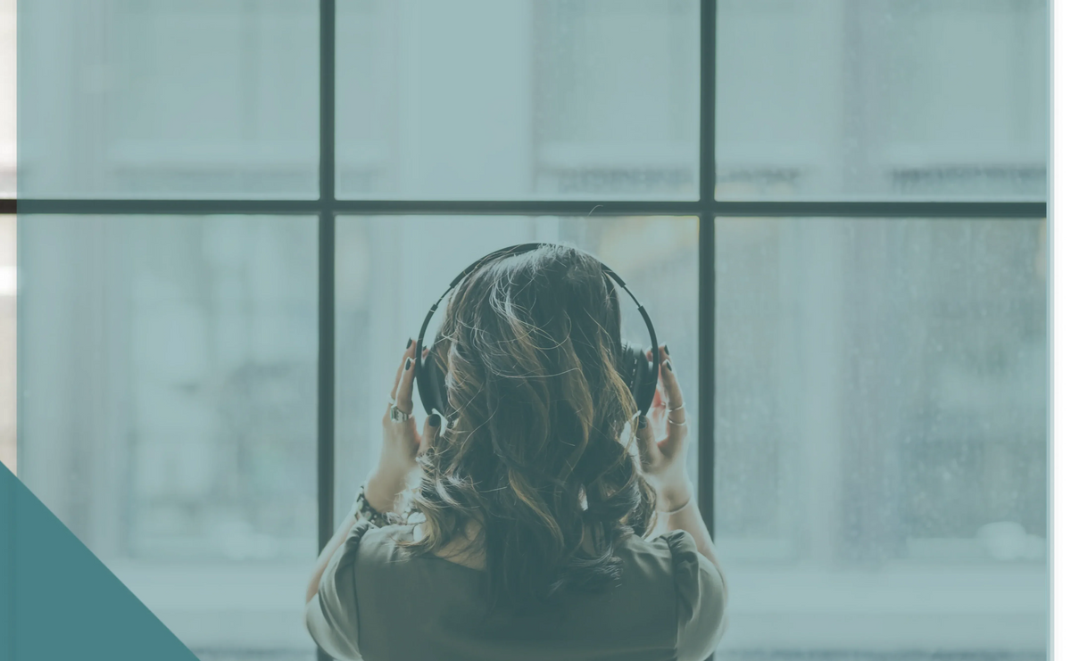 looking-out-window-wearing-headphones-1-1 1 (1)