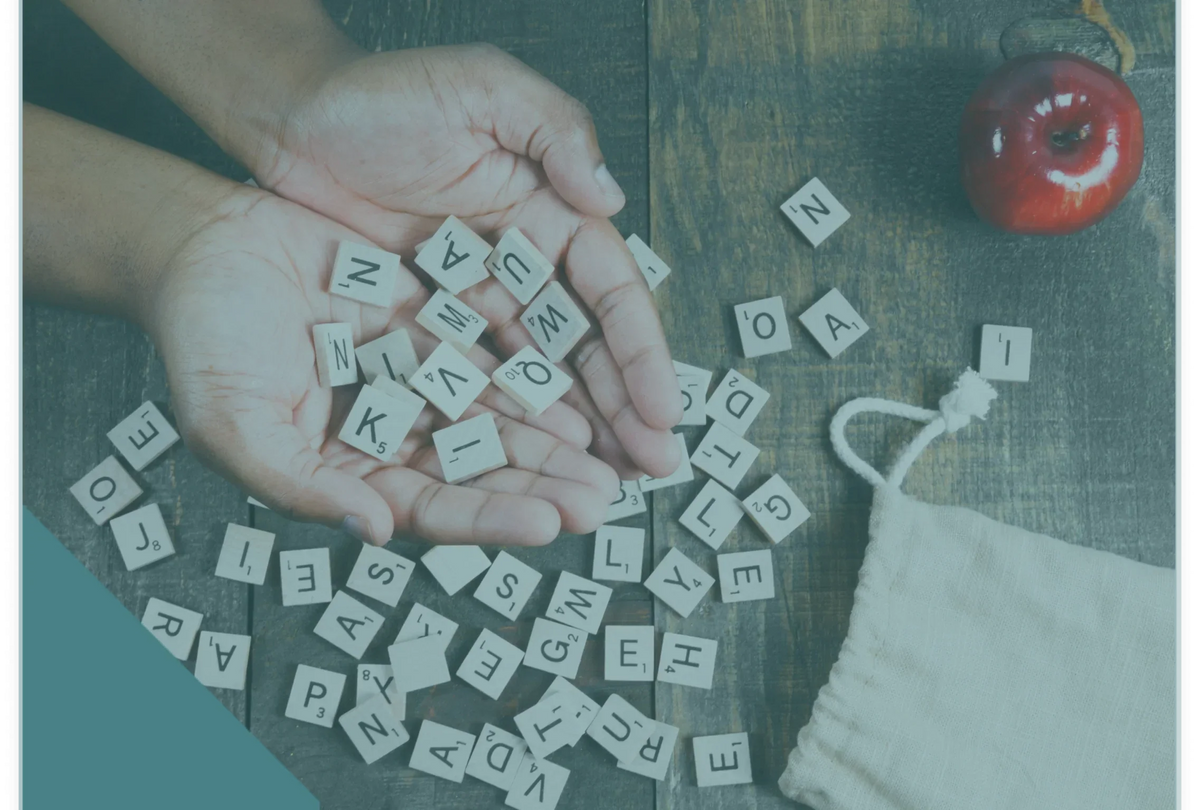 spelling-game-letter-tiles-in-hand-1-1 1