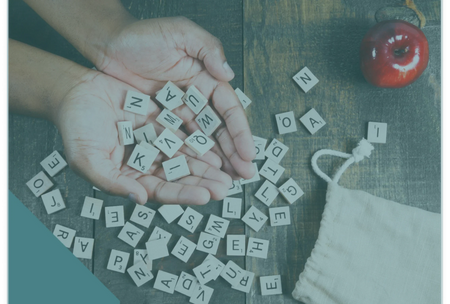 spelling-game-letter-tiles-in-hand-1-1 1