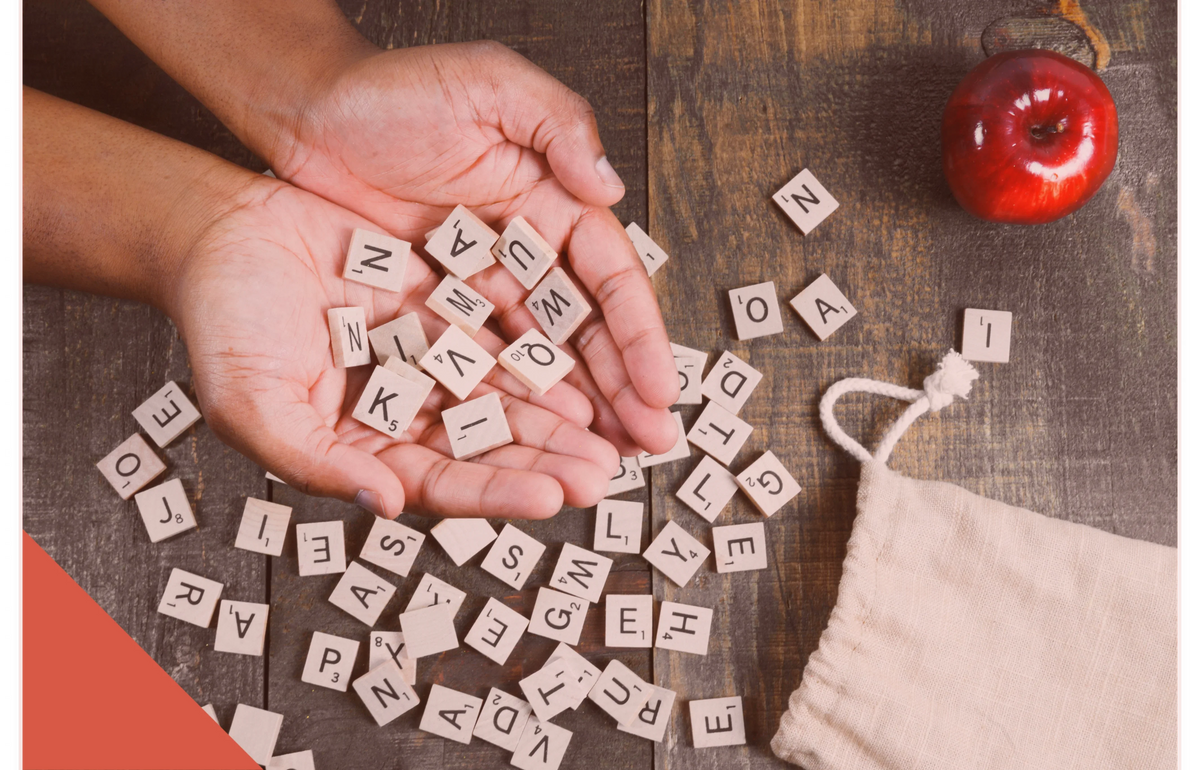 spelling-game-letter-tiles-in-hand (1) 1