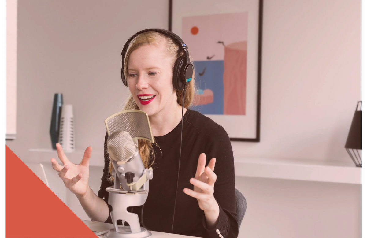 woman-recording-podcast-at-mic 1